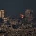 An explosion is seen following an Israeli bombardment in the Gaza Strip, as seen from southern Israel, Thursday, Nov. 23, 2023. (AP Photo/Leo Correa)
