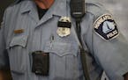 A Minneapolis police officer tested out a body camera before the department adopted them in 2017. A new policy prevents Minneapolis officers involved 