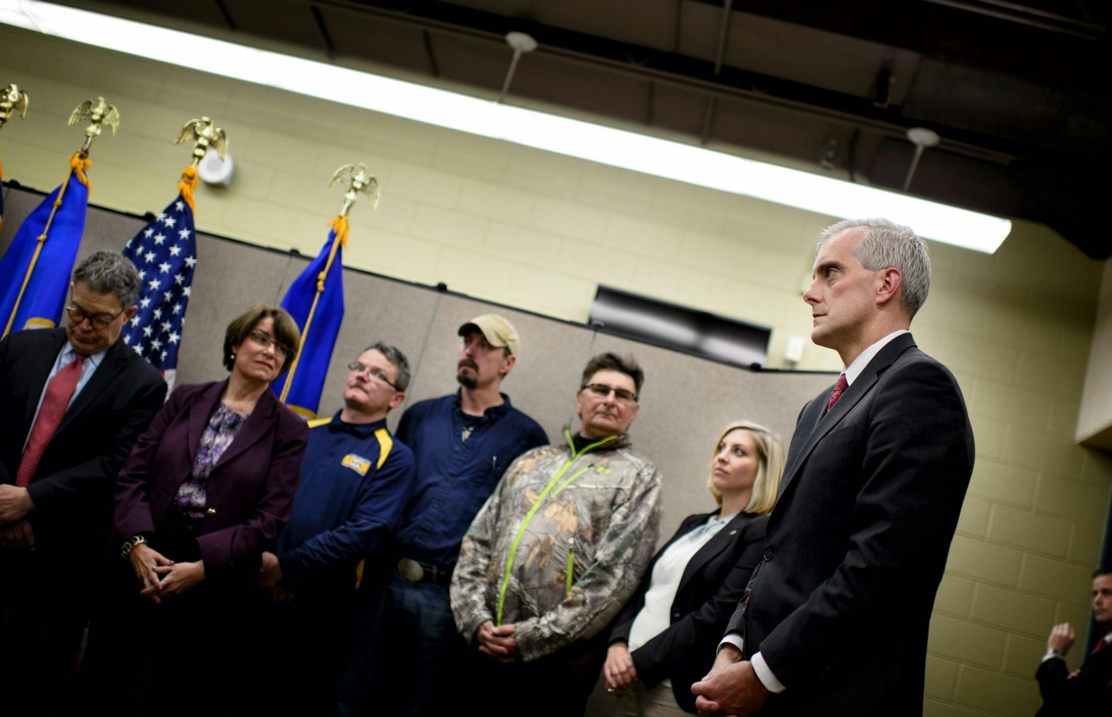 White House chief of staff Denis McDonough listened as U.S. Rep. Rick Nolan introduced him.
