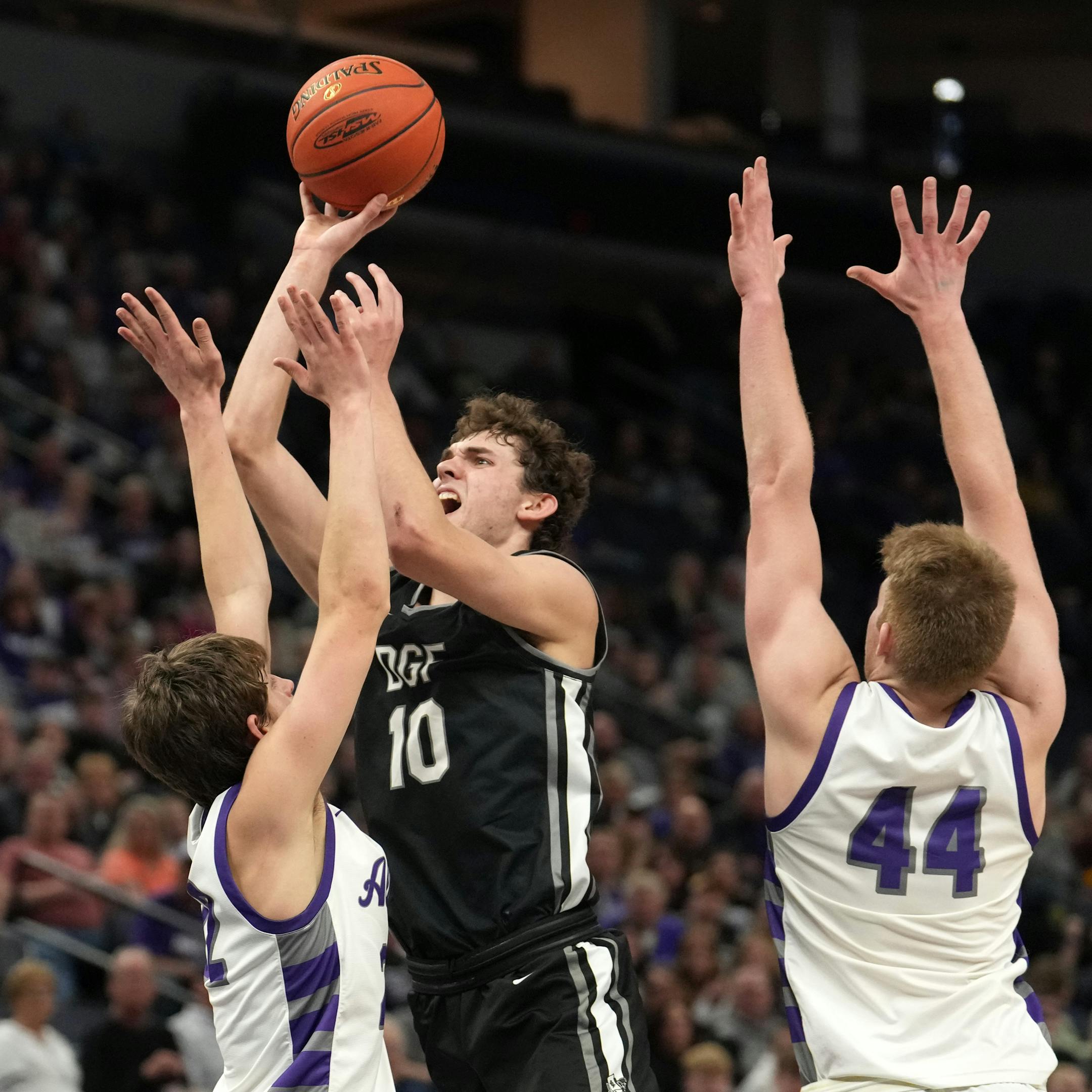 DGF guard Owen Leach (10) goes up for a shot in the second half.