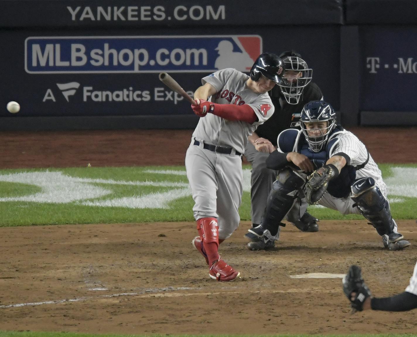 Boston Red Sox's Brock Holt connects for a two-run triple against the New York Yankees during the fourth inning of Game 3 of baseball's American League Division Series, Monday, Oct. 8, 2018, in New York. (AP Photo/Bill Kostroun)