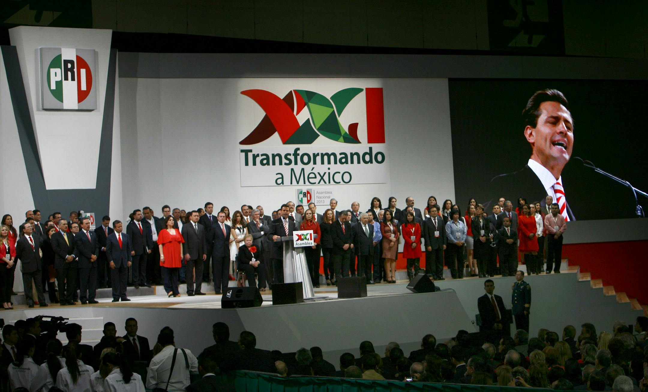 FILE - In this March 3, 2013 file photo, Mexico's President Enrique Pena Nieto delivers a speech during a national convention of his Institutional Revolutionary Party (PRI) in Mexico City. Pena Nieto has been fast out of the blocks in attacking some of Mexicoís toughest issues in a country often stymied by monopolies and corruption. He says his plan will make the country more democratic and competitive in the world economy, and his drive for reform is fueling international confidence about