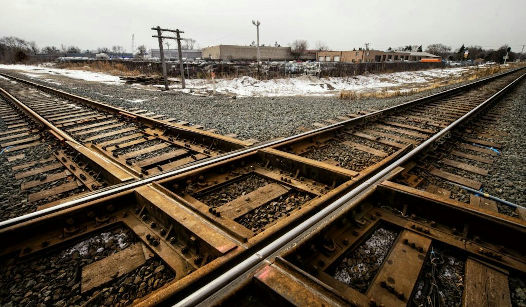 Burlington Northern Santa Fe and Canadian Pacific plan to create a connection here between their intersecting tracks in Crystal. A move that could affect traffic in the area and force local businesses in the background to relocate