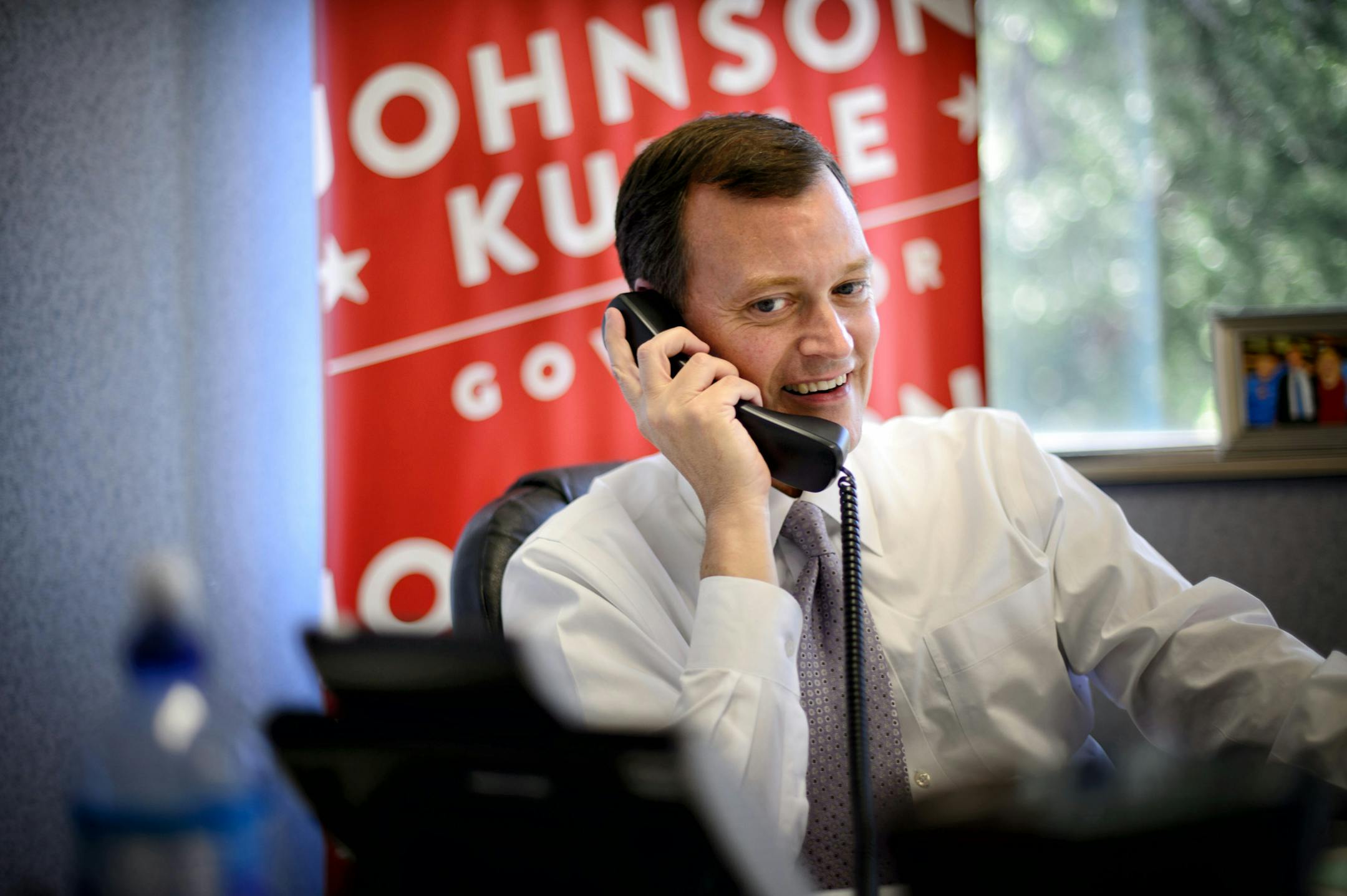 Jeff Johnson made calls to supporters Tuesday afternoon from his Golden Valley Headquarters, encouraging them to vote before the end of the day. ] Tuesday, August 12, 2014. GLEN STUBBE * gstubbe@startribune.com