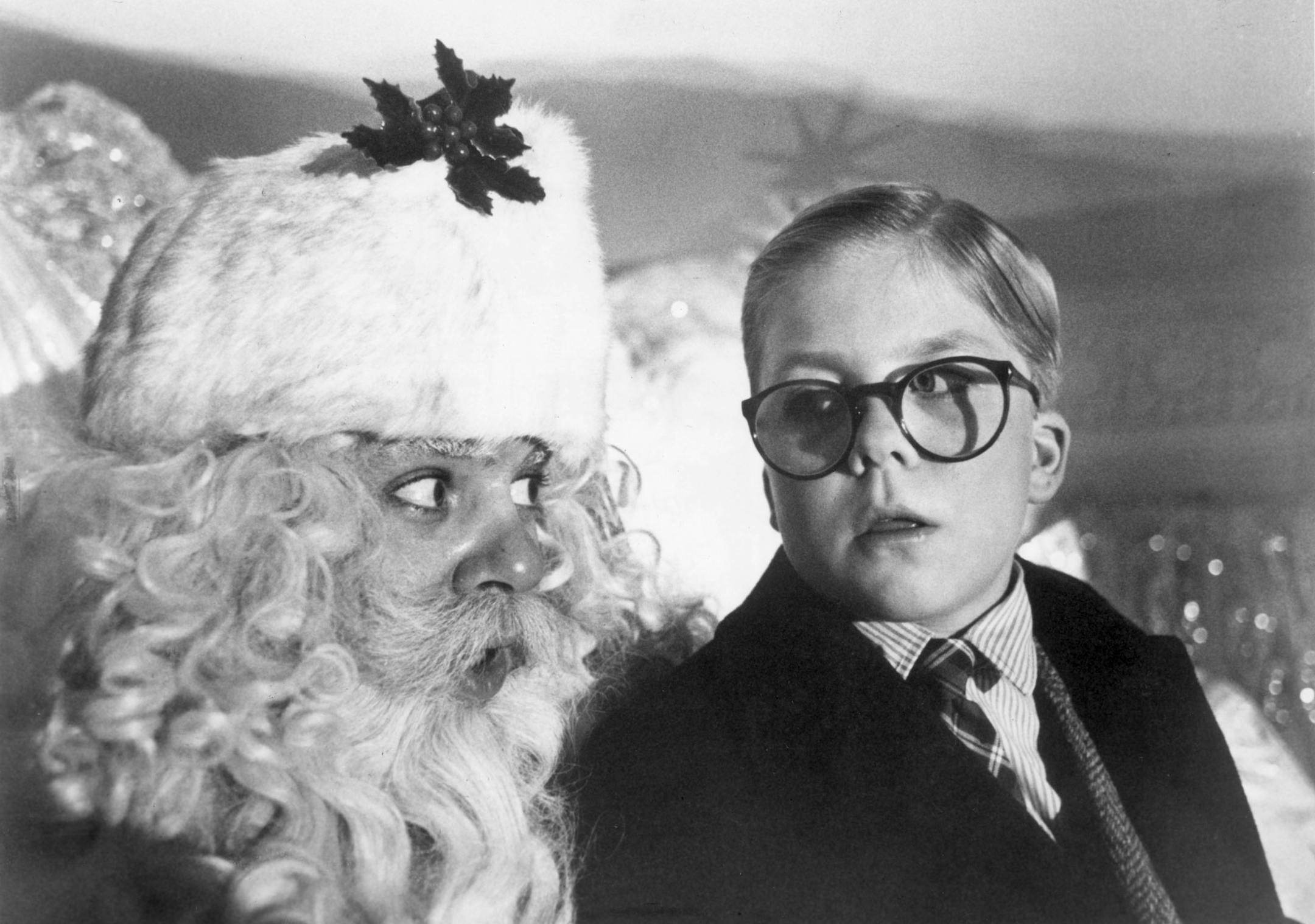 Ralphie (played by Peter Billingsley, at right) tells Santa of his fondest wish to own a Genuine Carbine Air Rifle in the 1983 movie "A Christmas Story." Handout photo courtesy of MGM/UA Entertainment.