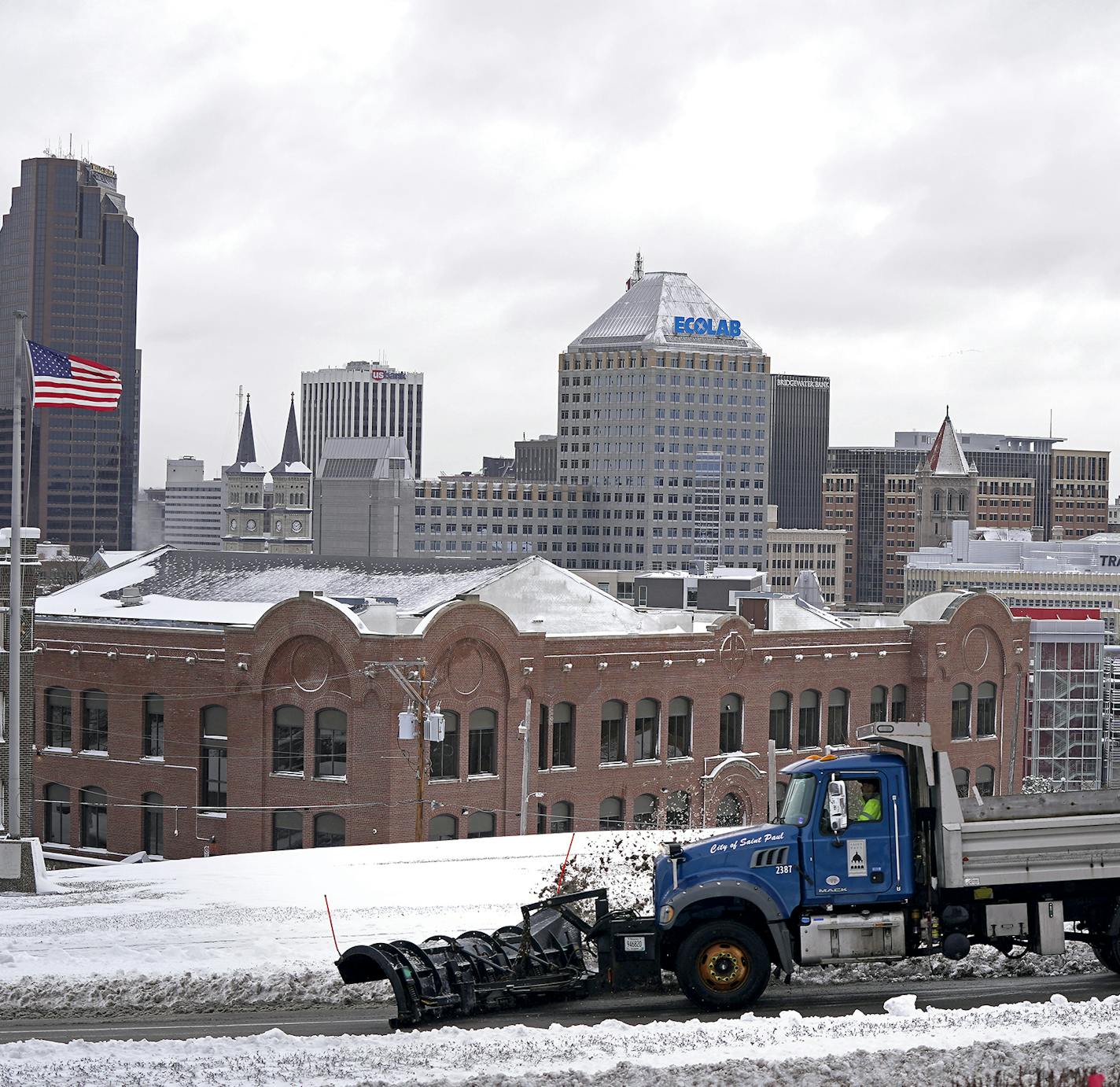 A plow truck made it's way down the hill in front of the Cathedral of St. Paul, with downtown St. Paul in the backdrop. ] LEILA NAVIDI &#x2022; leila.navidi@startribune.com BACKGROUND INFORMATION: The aftermath of a snowstorm in St. Paul on Wednesday, November 27, 2019. The largest November snowstorm in nine years socked the Twin Cities and much of southern and central Minnesota with heavy wet snow overnight Tuesday and into Wednesday.