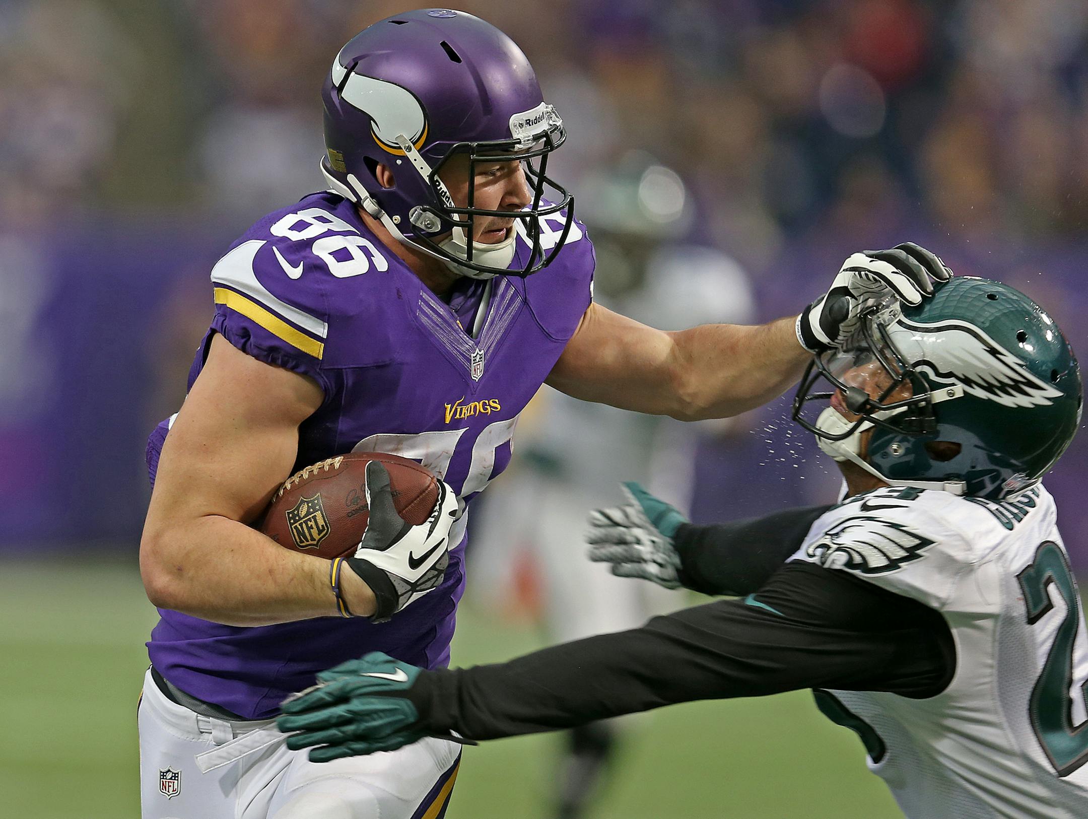 Vikings tight end Chase Ford, left, fended off Philadelphia free safety Patrick Chung to set up a touchdown in the fourth quarter on Dec. 15.