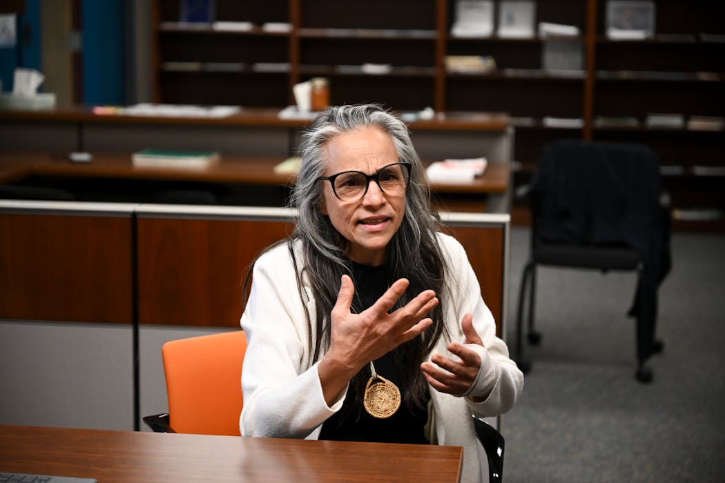 Mary Hermes, director of Grassroots Indigenous Multimedia at the U and co-director and lead writer of the video game “Reclaim!,” speaks about the game’s development on April 29 at the University of Minnesota’s Peik Hall.