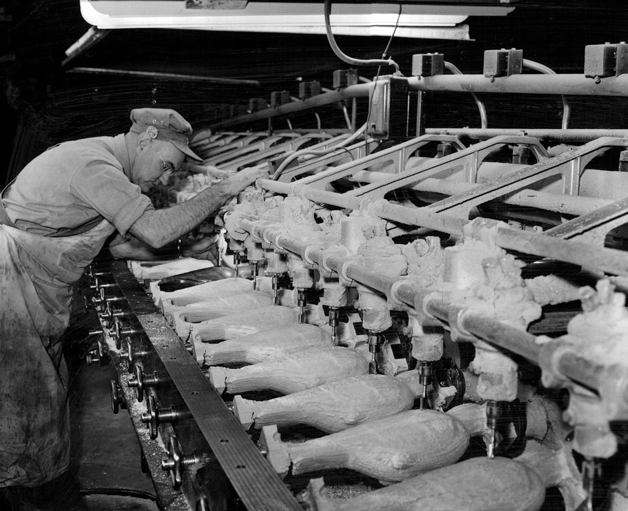 Joseph Jackson runs a wood duplicator machine to turn out a set of crow decoys for Herter's Inc. in this 1953 photo. The wood used is balsa from Central America. The same machines can produce duck, goose and owl decoys as well as gun stocks. Schutte - Barnett, Minneapolis Star Tribune ORG XMIT: MIN2015020415475143
