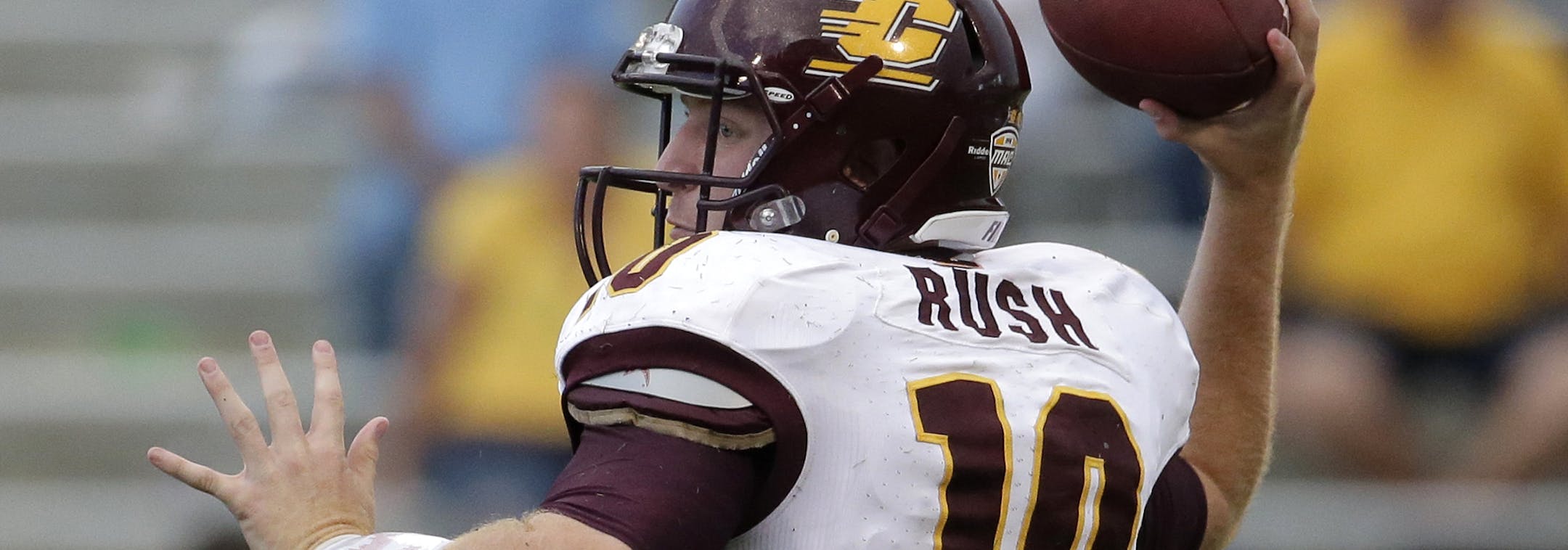 Central Michigan quarterback Cooper Rush (10) throws during the second half of an NCAA college football game Saturday, Sept. 20, 2014, in Lawrence, Kan. Kansas won 24-10. (AP Photo/Charlie Riedel) ORG XMIT: OTKCR