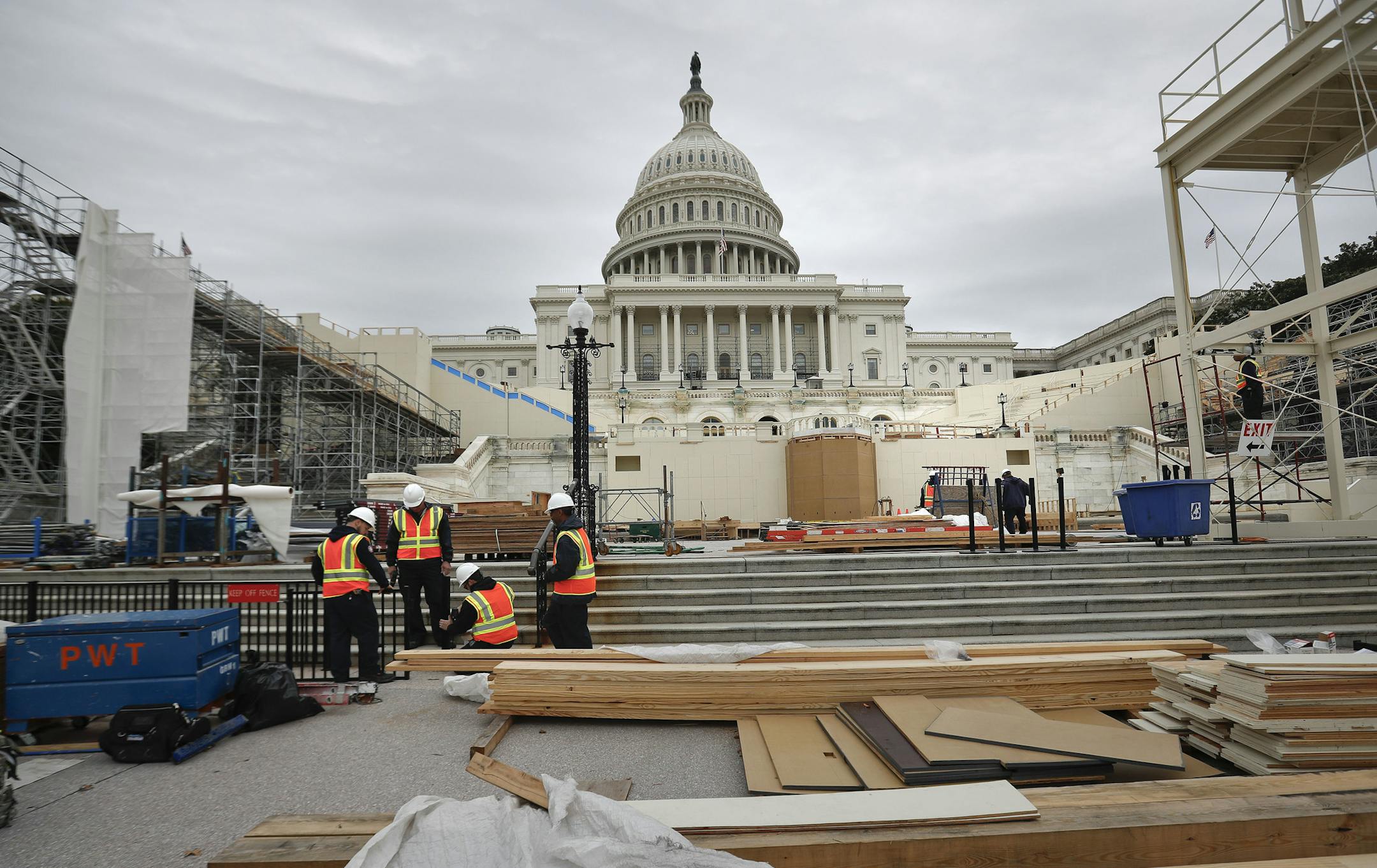 Construction continues on the Inaugural platform in preparation for the Inauguration and swearing-in ceremonies for President-elect Donald Trump, Thursday, Dec. 8, 2016, on the Capitol steps in Washington. Trump will be sworn in a president on Jan. 20, 2017. (AP Photo/Pablo Martinez Monsivais) ORG XMIT: DCPM114