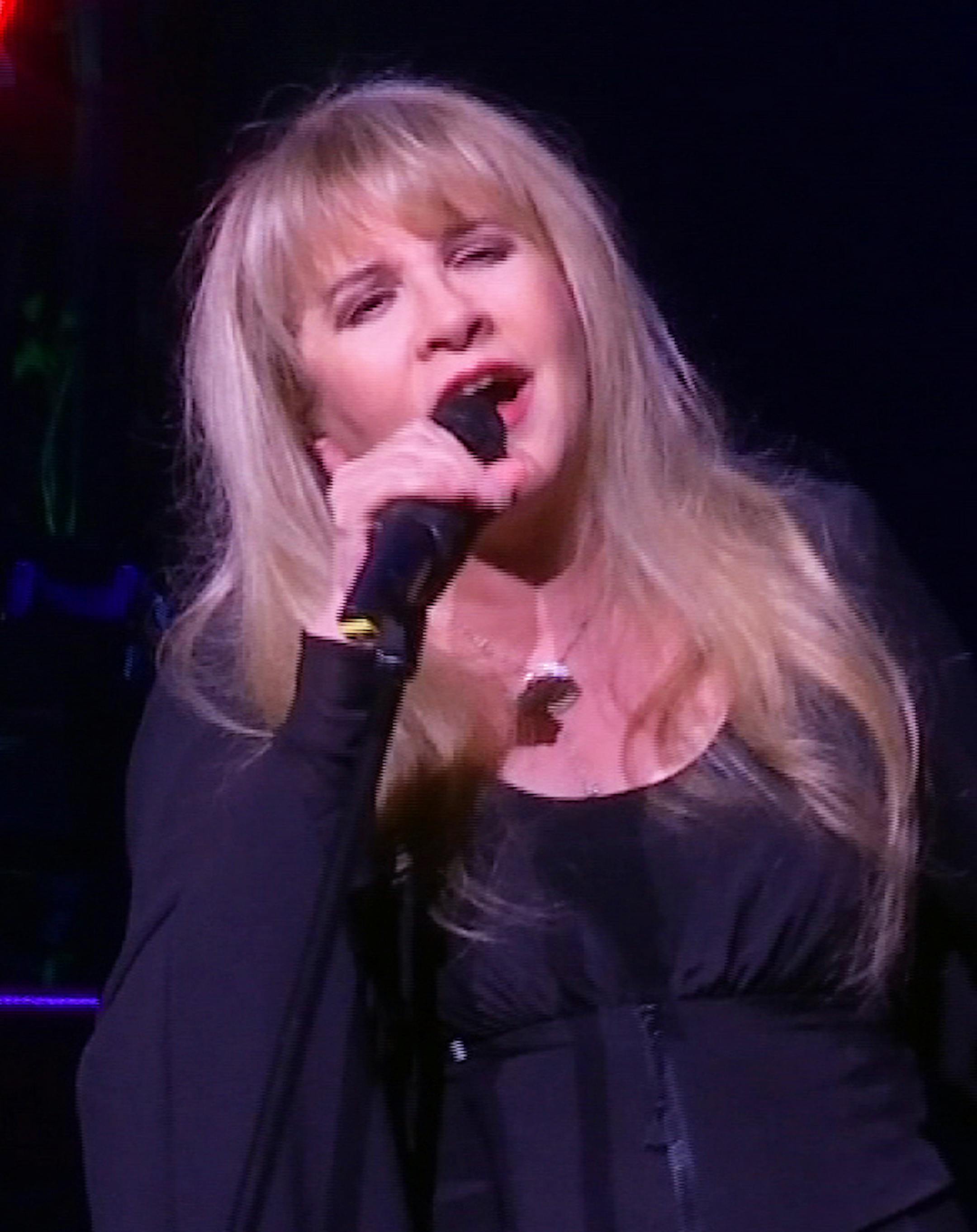 This image made from video shows singer Stevie Nicks singing "Rhiannon" during a surprise performance after the curtain call for the musical "School of Rock," Tuesday, April 26, 2016, in New York. (AP Photo/Bruce Barton)
