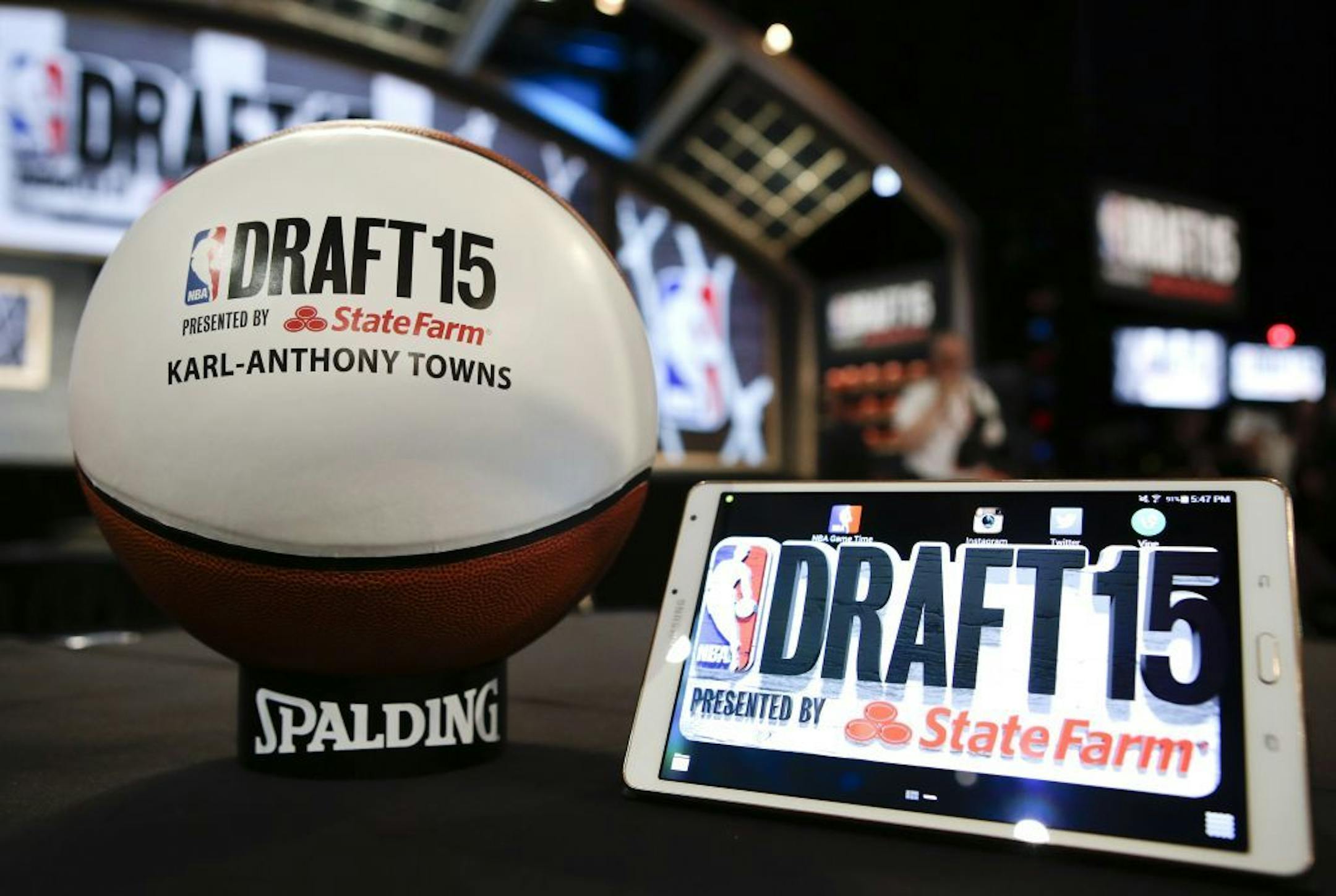 A basketball with the name of Karl-Anthony Towns' name on it sits on a table reserved for him before the NBA basketball draft, Thursday, June 25, 2015, in New York.