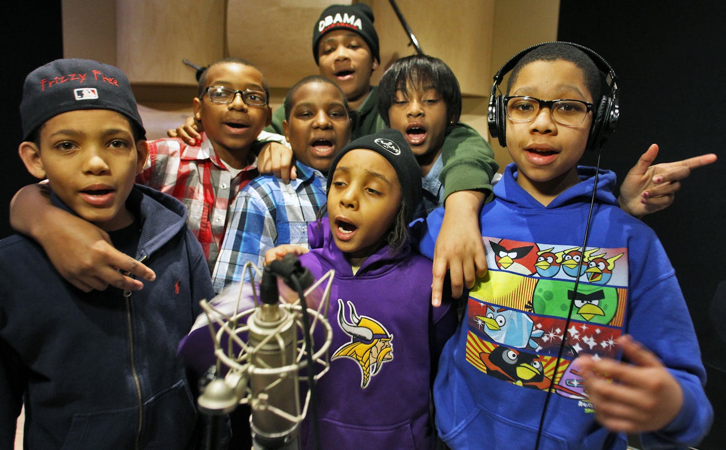 The KIDS from north Minneapolis who recorded the viral hit "Hot Cheetos & Takis". Here they rehearse in a Minneapolis recording studio. Frizzy Free, 10, Fly Guy Carter, 11, G6, 12, Chips, 14 (wearing Obama hat), Ben, 10, Lady J, 10 and Naz, 11. (MARLIN LEVISON/STARTRIBUNE(mlevison@startribune.com (cq -all names Melissa Mercedes - parent/group rep NOTE: MERCEDES PREFERRED TO USE THE KIDS STAGE NAMES) ORG XMIT: MIN1302070001250465 ORG XMIT: MIN1305160851170914