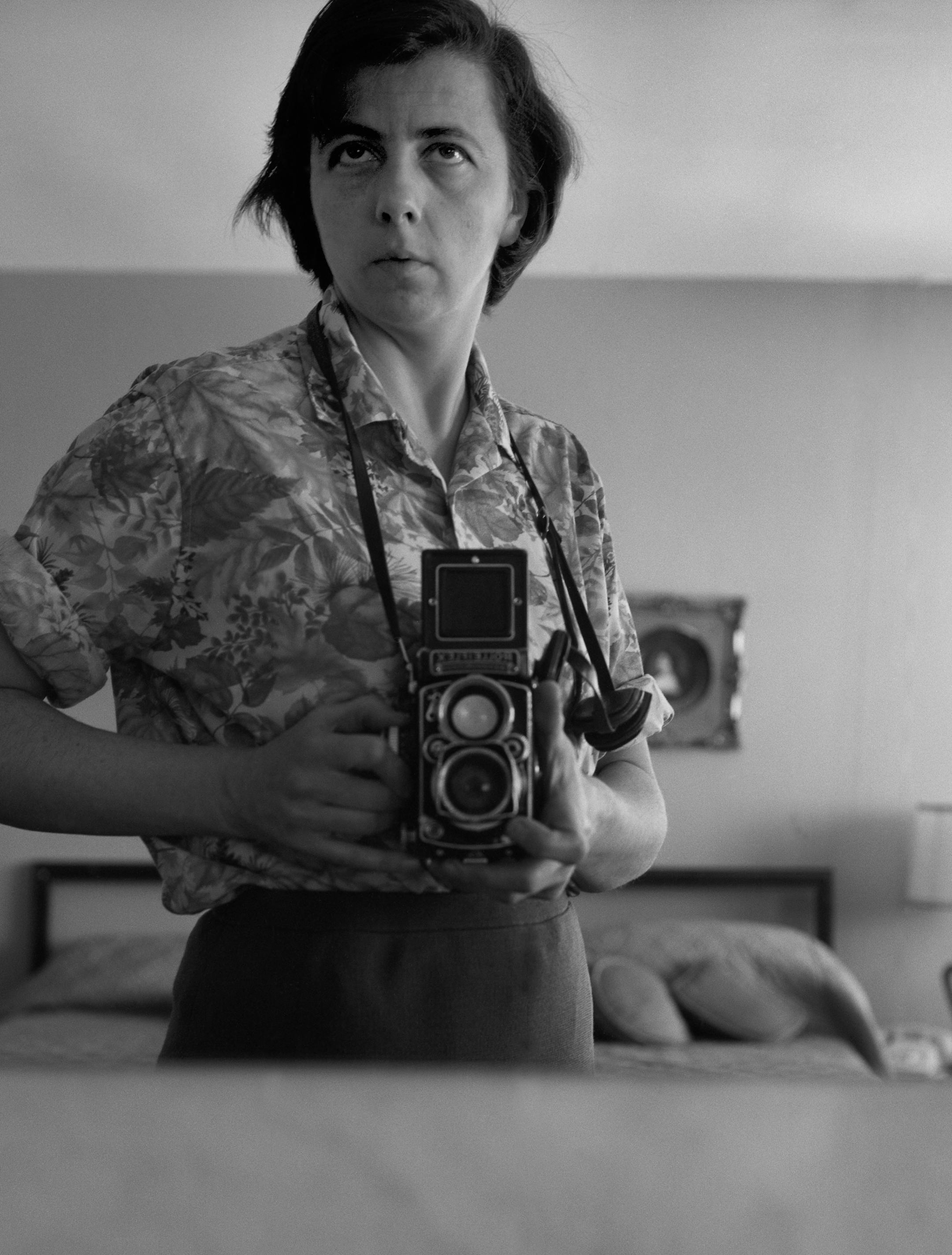 Vivian Maier photo, "Self-Portrait, Bedroom Mirror," Highland Park, 1965