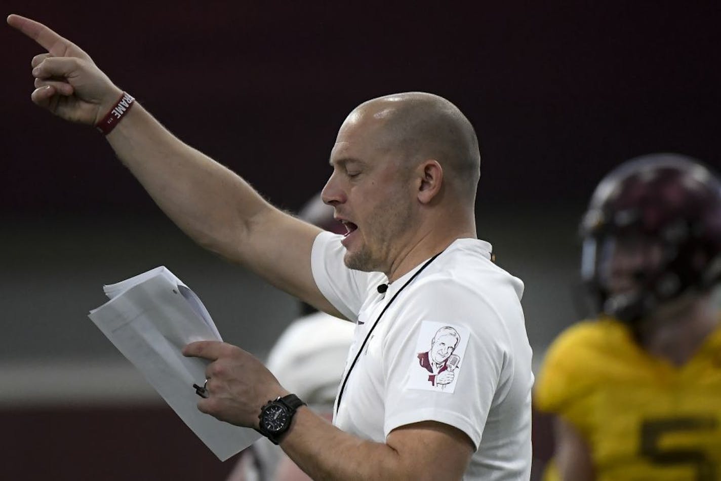 Minnesota Golden Gophers head coach P.J. Fleck wore a Sid Hartman sticker on his shoulder during Friday's practice.