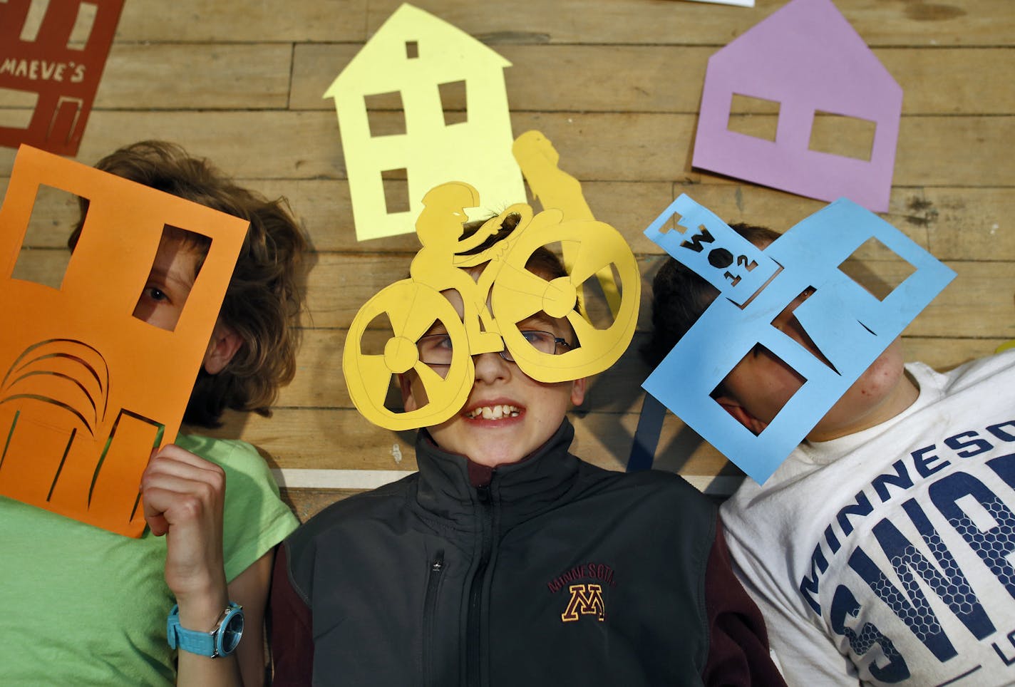 Molly McKenzie, 12, Will McKenzie, 12, and Sam McKenzie, 12 - all from Blaine - lined up for a frame to be included in the video. ] John Akre coordinated a Stop Motion Animation Station in the Northrup Building of Minneapolis, allowing the public to participate in an animation project as part of the weekend's Art-A-Whirl event. Over fifty people worked for ten hours to produce 1,200 frames resulting in a 2 minute video about NE Minneapolis.(MARLIN LEVISON/STARTRIBUNE(mlevison@startribune.com)