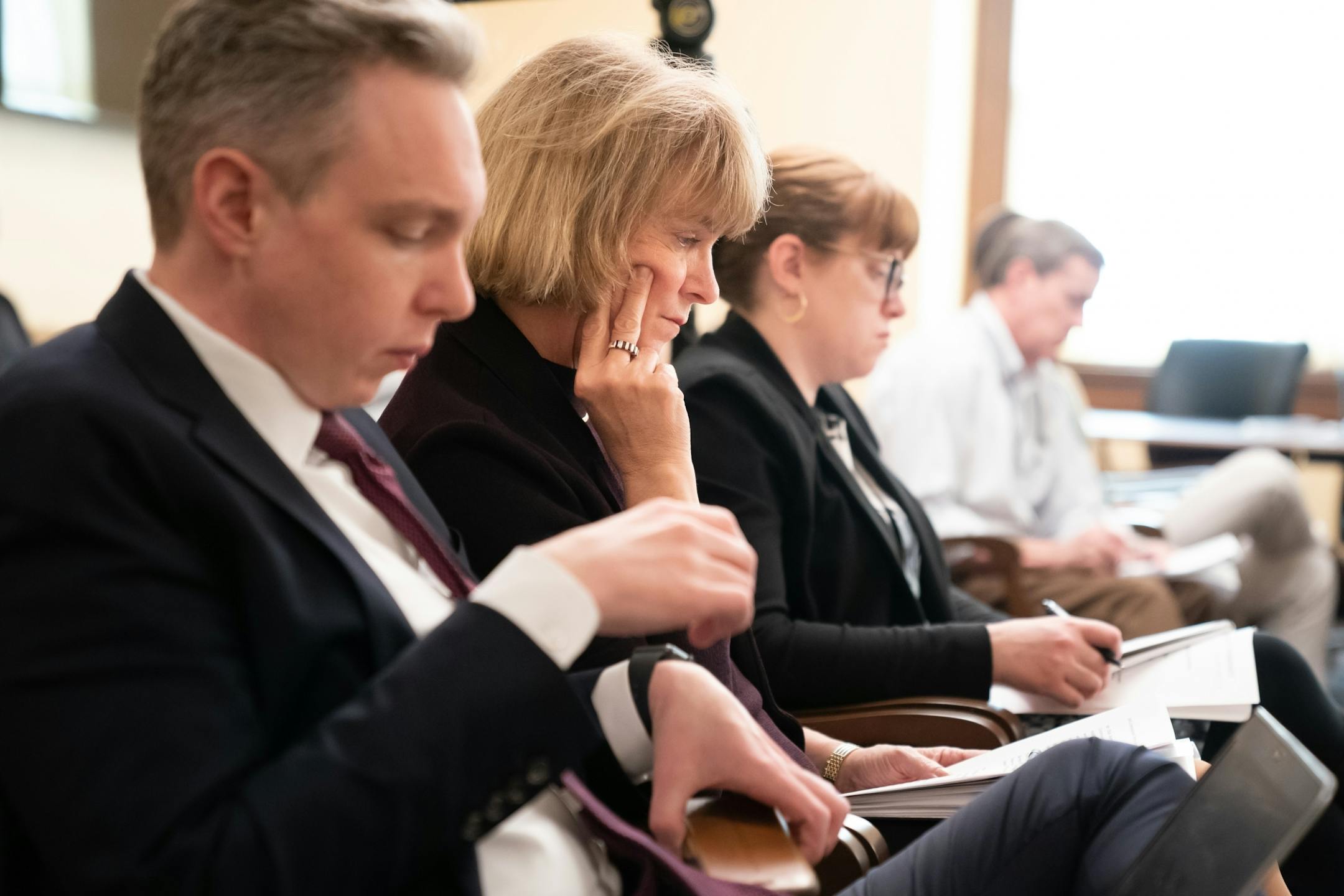 DHS Commissioner Jodi Harpstead listened as Legislative Auditor James Nobles discussed the results of his investigation into Medicaid overpayments by the state Department of Human Services (DHS) to Indian bands for opioid addiction treatment.