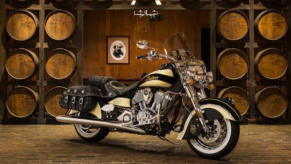 The collaboration includes a limited-edition Indian motorcycle with Jack Daniels labeling and color scheme.