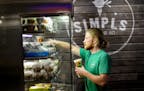 Owner Ryan Rosenthal works 60 hours a week at his Minneapolis shop, Simpls. He says paying overtime is "a dilemma."