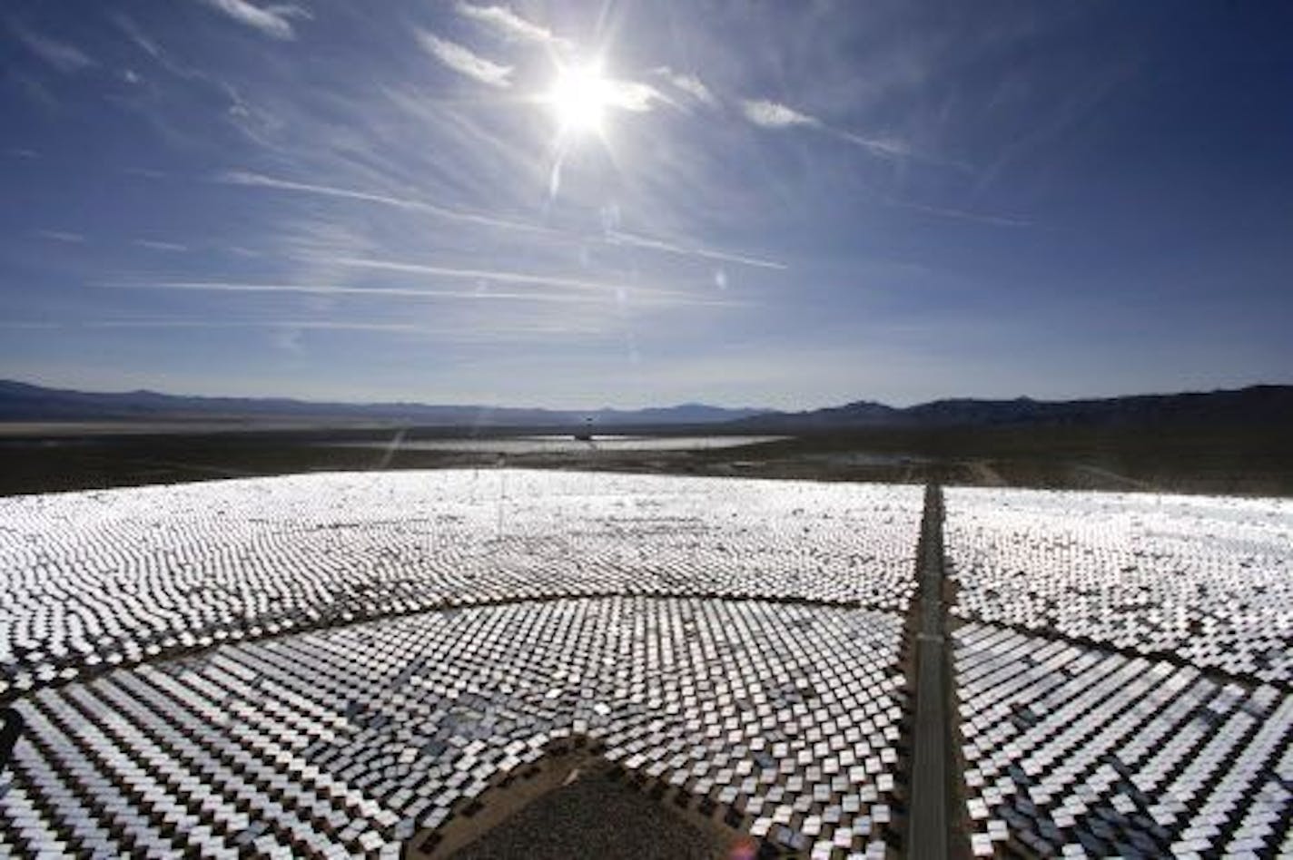 FILE - This Feb. 11, 2014 file photo shows some of the 300,000 computer-controlled mirrors, at the Ivanpah Solar ElectirIc Generating System in Primm, Nev.