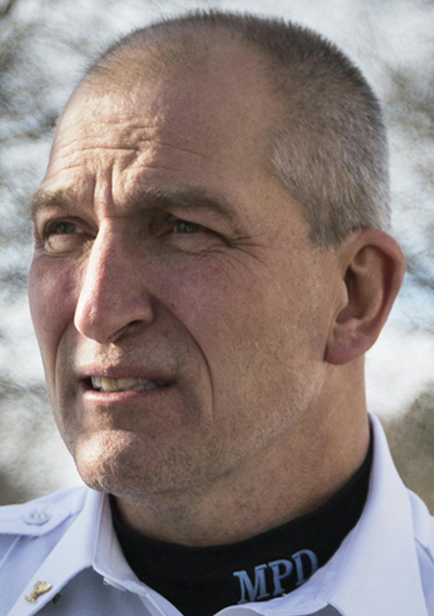 Inspector Mike Friestleben of Minneapolis Police Department's Fourth Precinct stands on the street near one of the houses where he lived growing up in north Minneapolis on Wednesday, January 27, 2016. ] (Leila Navidi/Star Tribune) leila.navidi@startribune.com