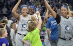 Minnesota Lynx Napheesa Collier and Odyssey Sims celebrated at the end of the game.