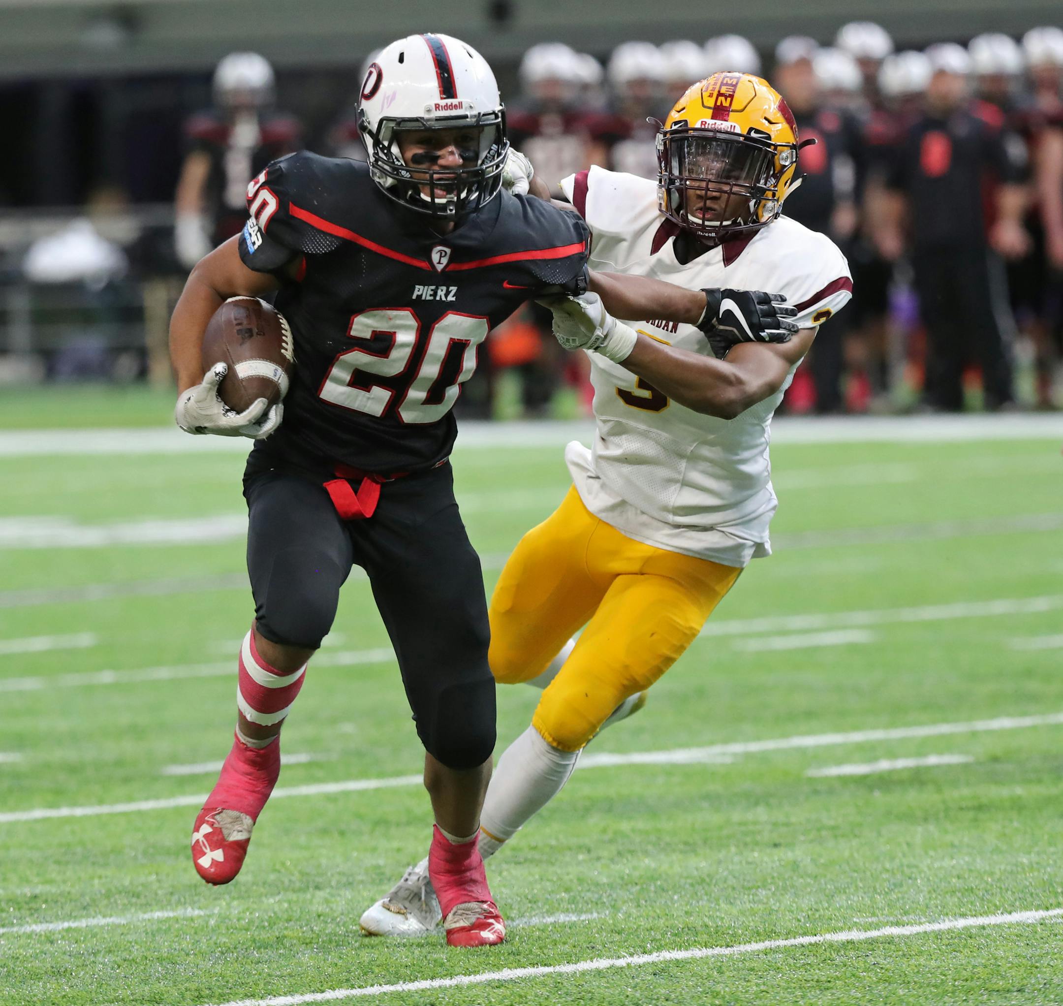 Pierz running back Jalen Jansen escaped a tackle by Jordan's Ako Butler and ran for a 9-yard touchdown. ] Shari L. Gross ï shari.gross@startribune.com Pierz defeated Jordan 55-26 in a Class 3A PrepBowl semifinal at U.S. Bank Stadium on Saturday, Nov. 18, 2017