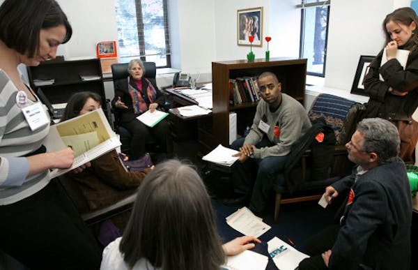 Members of the Joint Religious Legislative Coalition talked with State Sen. Linda Berglin, DFL-Minneapolis, seated in the background, about health and