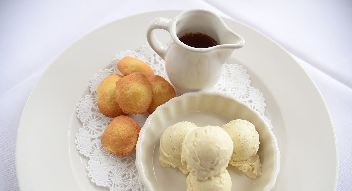 Vincent's Favorite Childhood Dessert. ] (SPECIAL TO THE STAR TRIBUNE/BRE McGEE) **Vincent's Favorite Childhood Dessert (vanilla ice cream, warm chocolate sauce, homemade madeleine cookies)