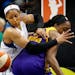 Minnesota Lynx Maya Moore (23) fought for a loose ball with Nneka Ogwumike (30) in the fourth quarter.