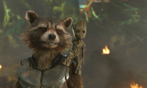 This image released by Disney shows the Rocket, voiced by Bradley Cooper, left, and Groot, voiced by Vin Diesel in a scene from Marvel's "Guardians Of The Galaxy Vol. 2." (Marvel Studios/Disney via AP)