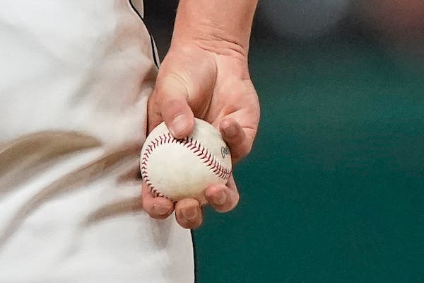 A pitcher caught using a “sticky’’ substance will be suspended for 10 games — with pay.