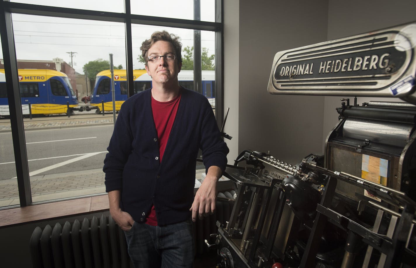 Brian Durk, owner of Dick & Jane Letterpress, was photographed alongside a Heidelberg press as a Green Line train passed by his business on Thursday, June 4, 2015 in St. Paul. ] Aaron Lavinsky &#x2022; aaron.lavinsky@startribune.com As the anniversary of the Green Line's opening approaches, we take another look to see how development along the line has progressed in the first year. Story focuses on St. Paul's University Avenue, the most challenged stretch of the 11-mile route. Bottom line: while