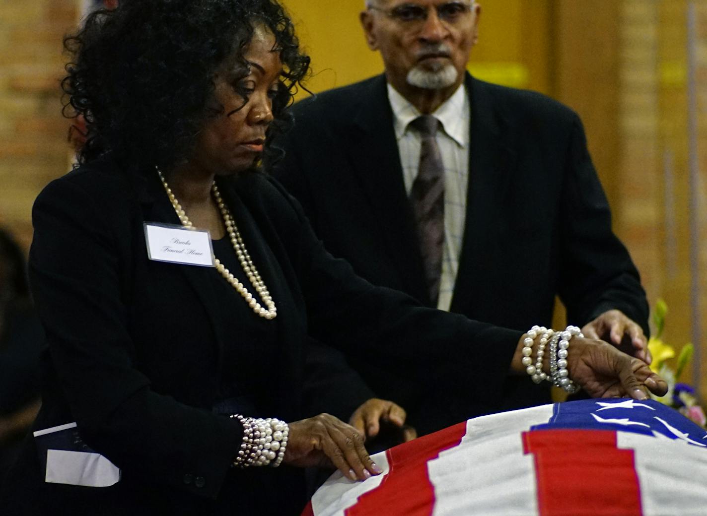 At New Hope Baptist Church, Margaret and George Brooks makes sure that Herman Walker,63, la US Army Veteran has a properly set United States flag on his casket.]Since opening in 1941, Brooks Funeral Home in St. Paul has become a trusted fixture in the black community. Margaret Brooks runs the home with her husband, George and several of the sons. Richard Tsong-taatarii@startribune.com