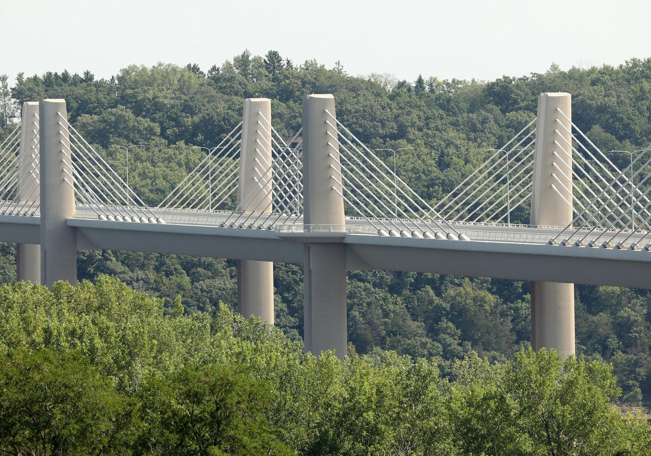 The new St. Croix River bridge could be seen in the distance from the ribbon-cutting ceremony. ] ANTHONY SOUFFLE ï anthony.souffle@startribune.com Officials held a ribbon-cutting ceremony for the new St. Croix River bridge Wednesday, Aug. 2, 2017 in Oak Park Heights, Minn.