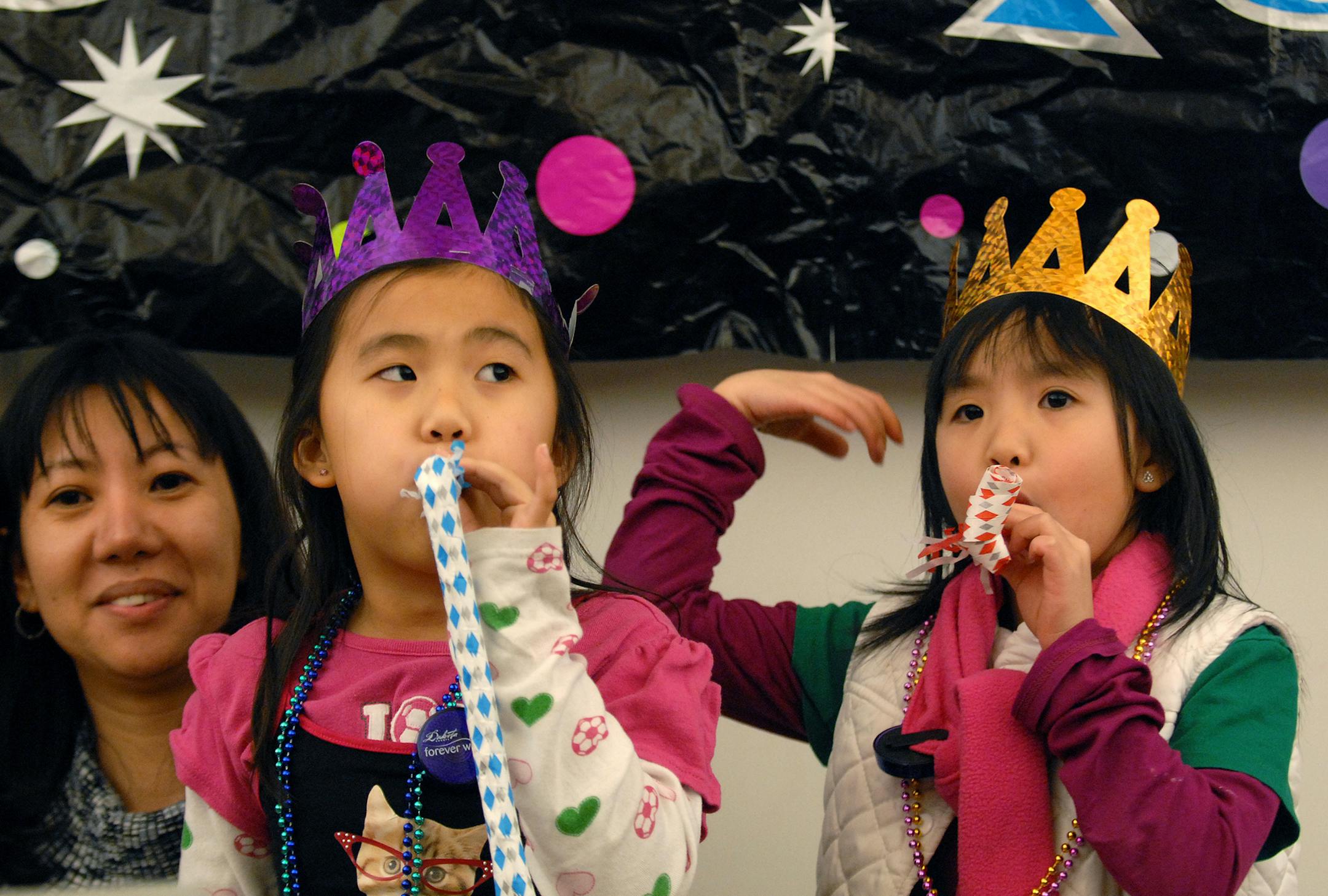 2013; Adults; Diversity; Family; Female; Group; Lebanon Hills Regional Park; New Year's Eve Party; Parks; Winter. Photo by Dakota County Parks