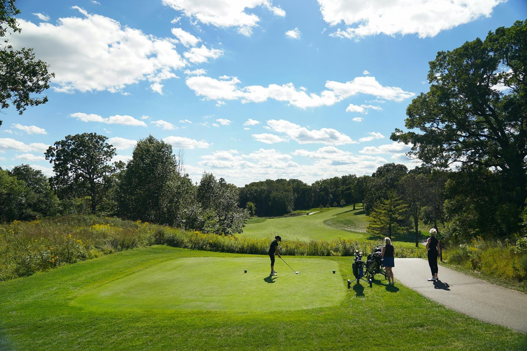 Golfers endured a windy day to get out on the links at Keller Golf Course in Maplewood.