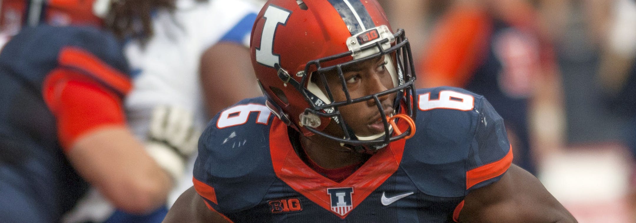Illinois running back Josh Ferguson (6) runs the ball during the first quarter of an NCAA football game against Middle Tennessee Saturday, Sept. 26, 2015 at Memorial Stadium in Champaign, Ill. (AP Photo/Bradley Leeb)