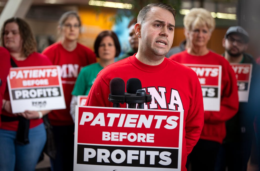 Jeremy Olson-Ehlert, an RN and MNA co-chair at HCMC, spoke during a press conference at Hennepin County Government Center in Minneapolis on Tuesday.