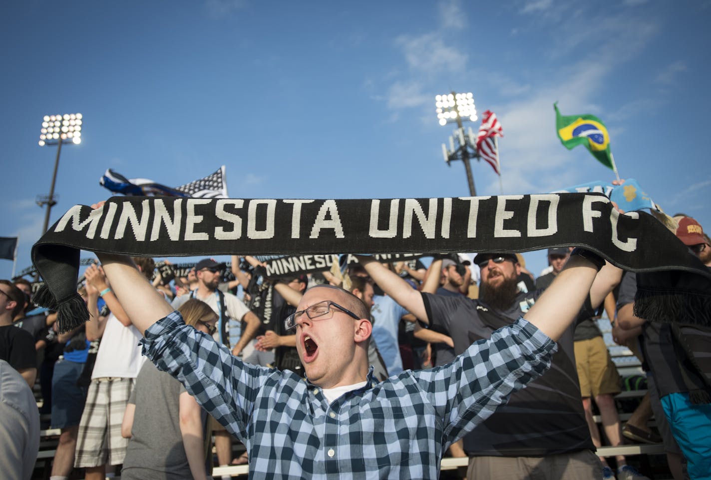 David Martin, of Prior Lake, held up his Minnesota United FC scarf