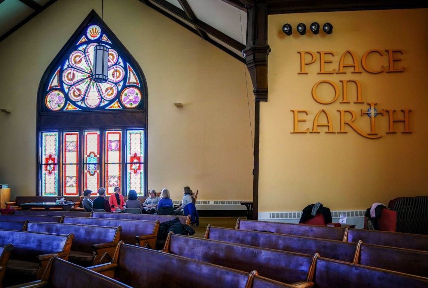 Members of prayer group that meets four days a week gather for what they call centering prayer, silent prayer/contemplation in the church sanctuary of First United Church of Christ.