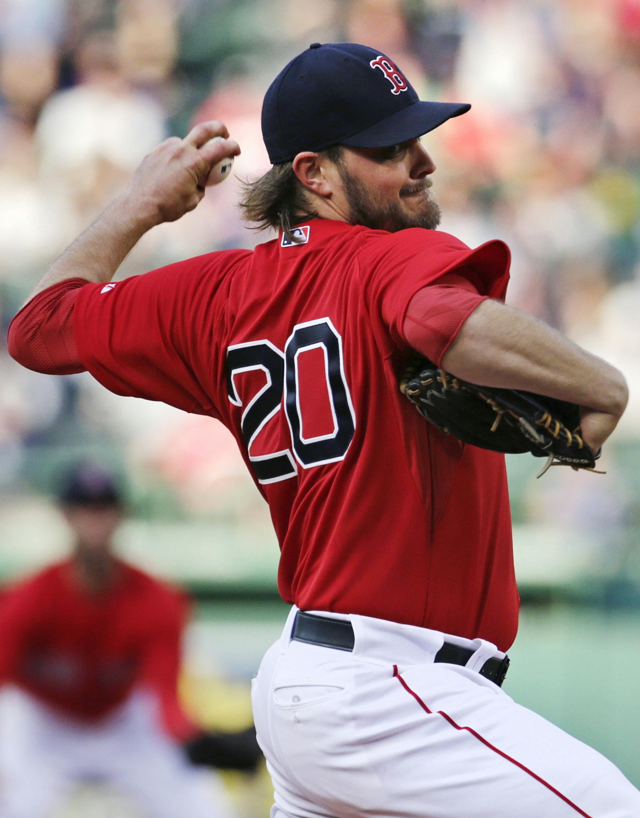 Boston Red Sox starting pitcher Wade Miley delivers against the Oakland Athletics in the first inning during a baseball game at Fenway Park in Boston, Friday, June 5, 2015. (AP Photo/Charles Krupa)