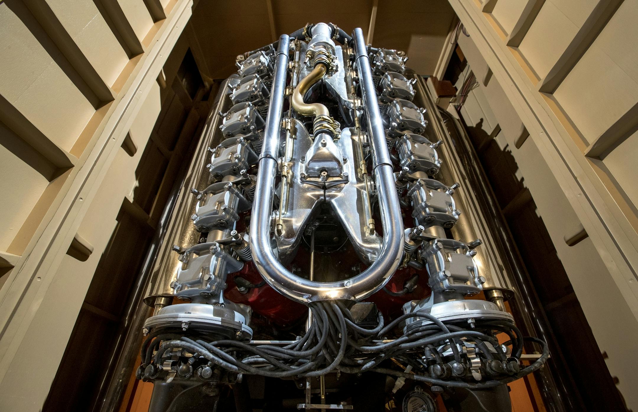 The engine in the Bolo Babe a World War I 400 HP Liberty Aircraft engine. The Bolo Babe is a 1926 33-foot Baby Gar built by Garwood. The boat is part of a collection belonging to John Allen.