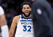 Karl-Anthony Towns celebrated a Timberwolves victory at Ball Arena in Denver on Monday night.