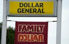 Dollar General and Family Dollar shared the same marquee sign space in this Pearl, Miss., strip mall on Sept. 6.