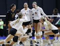 Members of the Minnesota team celebrate as they clinch the win over Hawaii Saturday, Dec. 12, 2015, during the NCAA Division I Women's Volleyball Cham