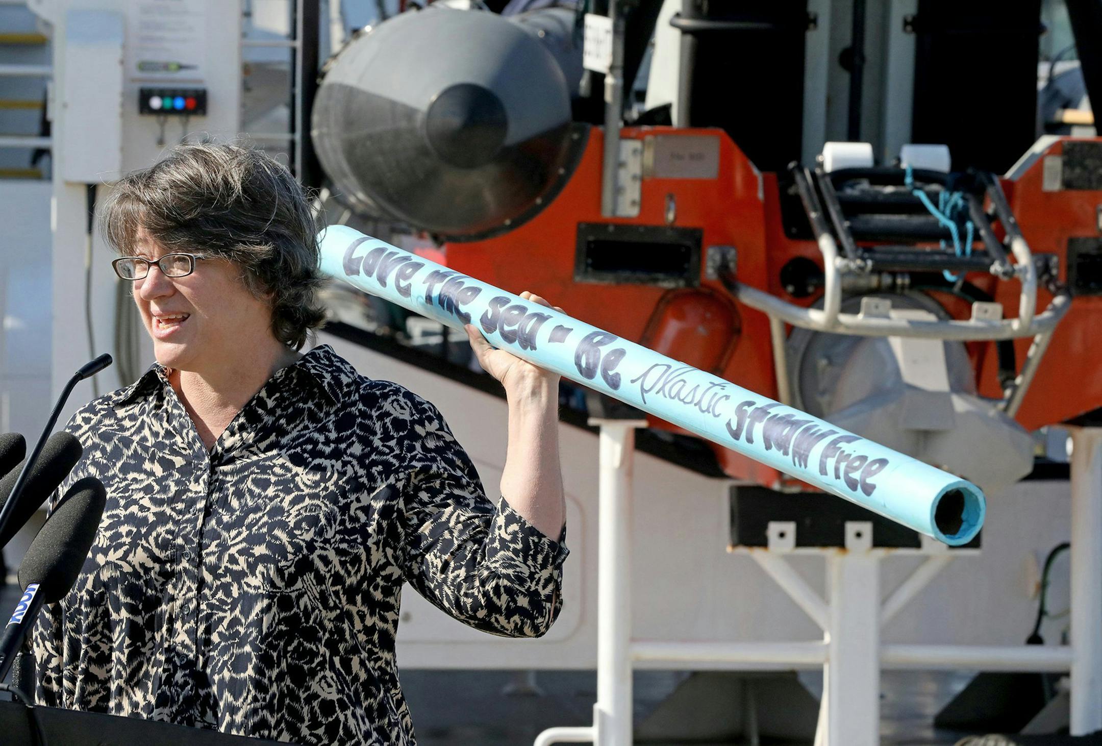 Standing on the deck of the Greenpeace ice breaker last month, Arctic Sunrise, Heather Trim, executive director of Zero Waste Washington, displays a straw that reads, â€œSAVE THE SEA, BE PLASTIC STRAW FREE.â€ Effective July 1, plastic straws and utensils will be prohibited in Seattle because they are not recyclable. (Greg Gilbert / Seattle Times/TNS)SEATTLE OUT, USA TODAY OUT, MAGAZINES OUT, ONLINE OUT, TELEVISION OUT, SALES OUT.