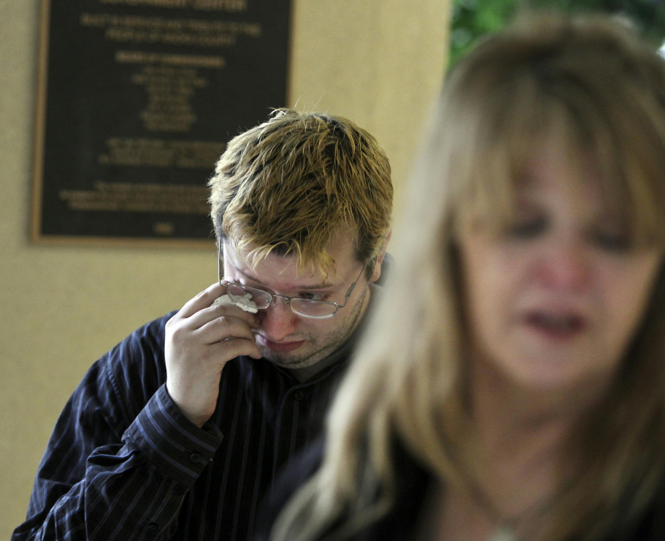 John Robinson, left, and his mother, Jill Robinson, attended the hearing for Timothy LaMere, who pleaded guilty to third-degree murder in the synthetic drug death of their brother and son, Trevor Robinson. He died after taking the drug at a party last year.