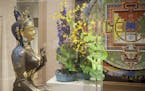 The arrangement in the Asian galleries is inspired by a bronze statue and the Yamantaka Mandala from last year's Art in Bloom. Provided by Minneapolis